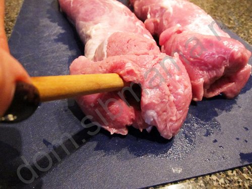 Фаршированная свиная вырезка в беконе